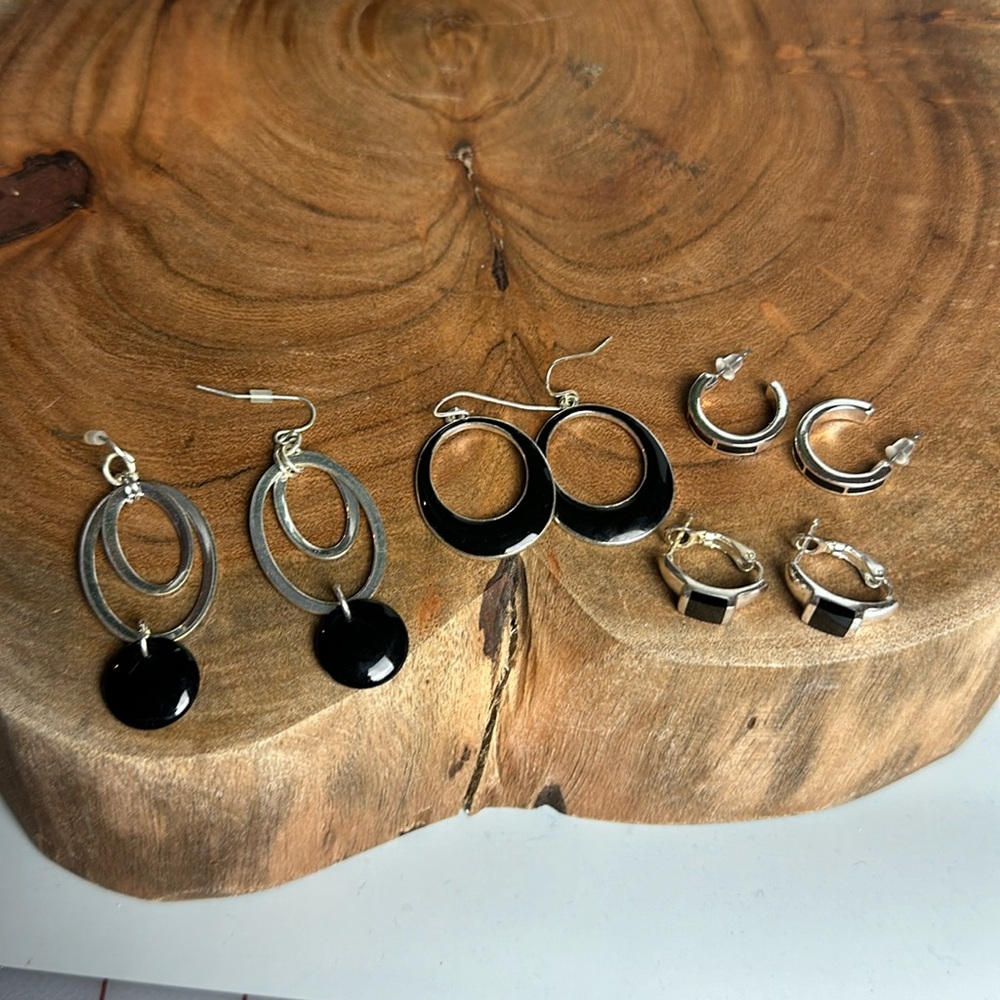 Four Pairs of Silver and Black Earrings